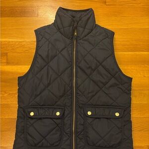 J Crew navy quilted vest. Size small.
